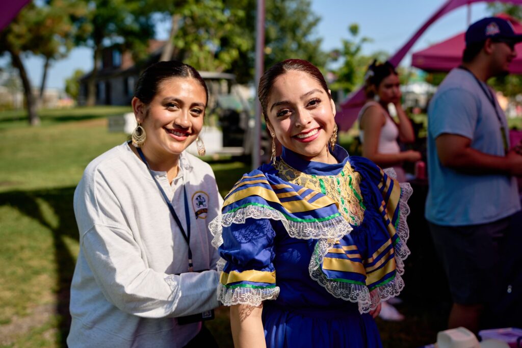 two ladies smiling